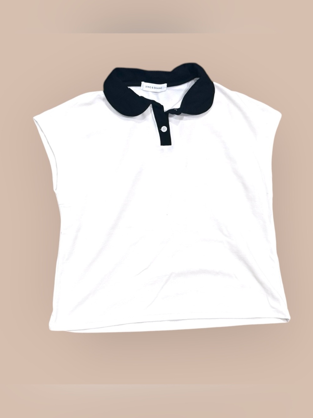 Women’s black & white Color-block polo size small